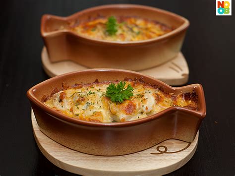 chicken-and-mushroom-baked-rice-with-cheese image