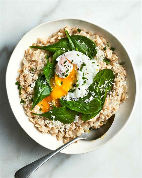 savory-oatmeal-with-spinach-and-poached-eggs image