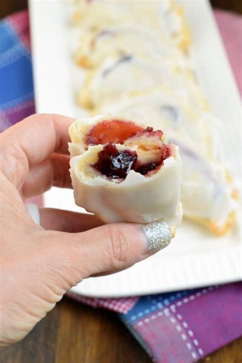 easy-baked-berry-hand-pies-recipe-shugary-sweets image