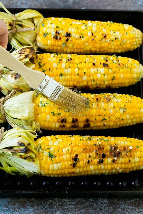 wwwgarlicrecipesca-garlicky-grilled-corn-on-the-cob image