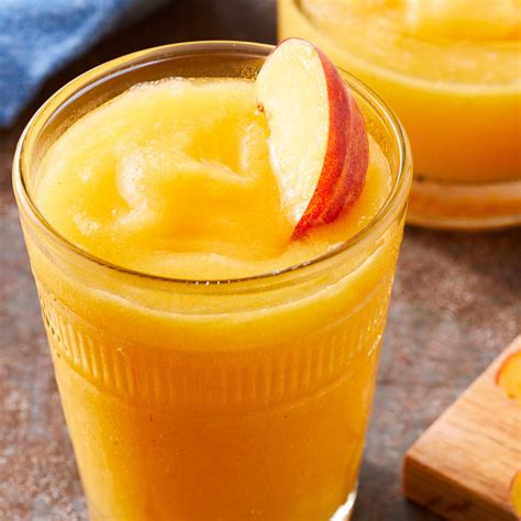frozen-peach-margaritas-recipe-eatingwell image