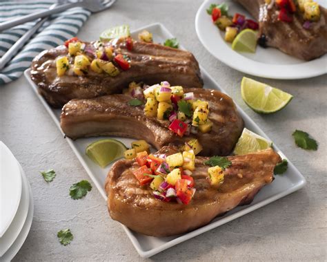 jerk-marinated-pork-chops-with-pineapple-salsa image