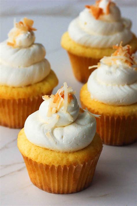 coconut-and-lemon-curd-cupcakes-how-to-feed-a image