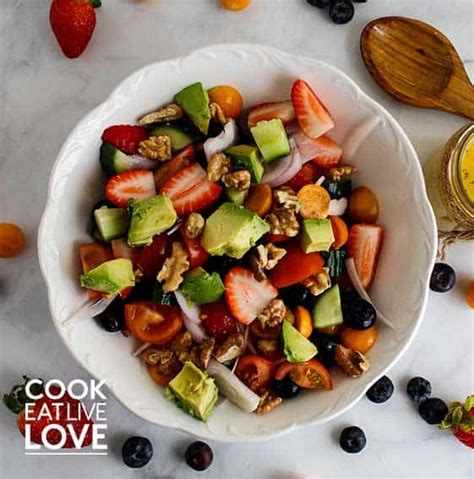 summer-berry-salad-with-passion-fruit-vinaigrette image