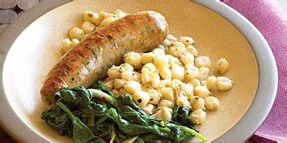 sausage-with-hominy-and-spinach-recipe-myrecipes image