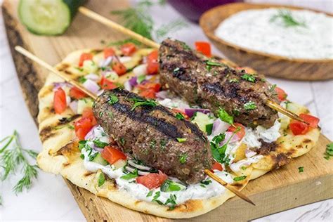 grilled-beef-kofta-kabobs-served-with-grilled-naan-and image