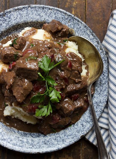 braised-beef-stew-with-cranberries-seasons-and-suppers image