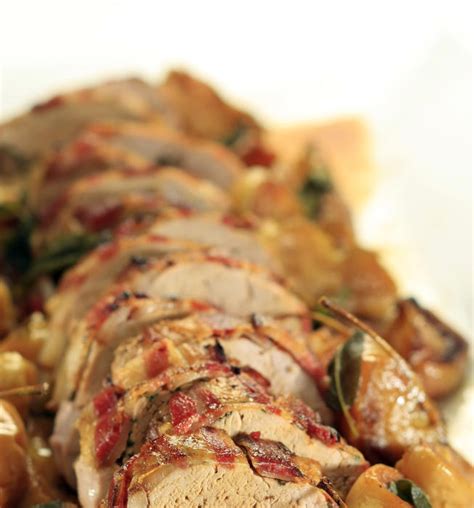 bacon-wrapped-pork-loin-with-roasted-apples image