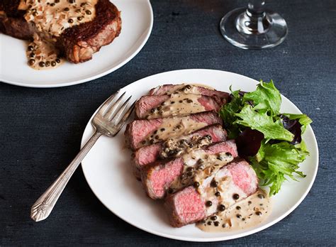 andrew-zimmern-cooks-steak-au-poivre-andrew image