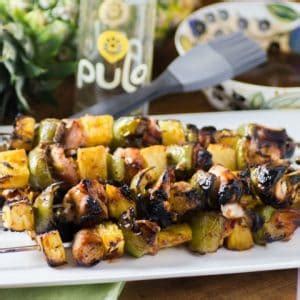 bacon-wrapped-chicken-pineapple-skewers image