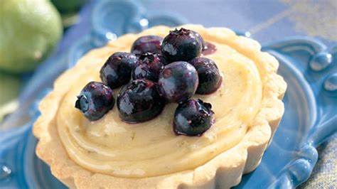 blueberry-tartlets-with-lime-curd-recipe-bon-apptit image