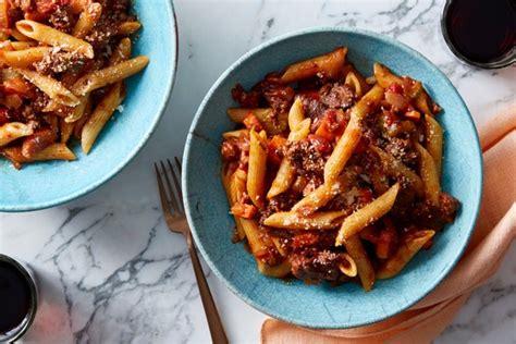 penne-pasta-beef-bolognese-with-pecorino-cheese image