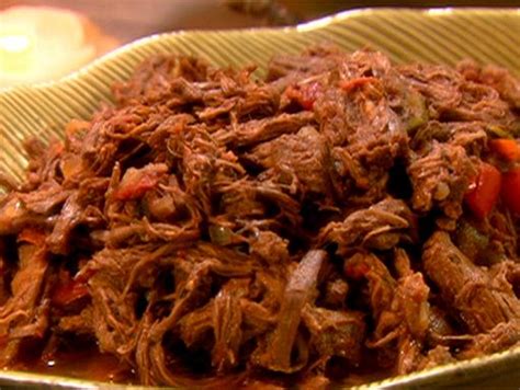 shredded-steak-with-peppers-onions-and-tomatoes image