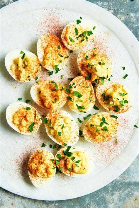 14-delicious-deviled-egg-recipes-with-to-die-for-toppings image