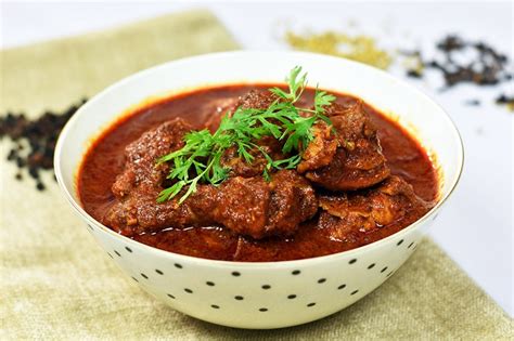 chicken-xacuti-chicken-curry-in-local-spice-blend image