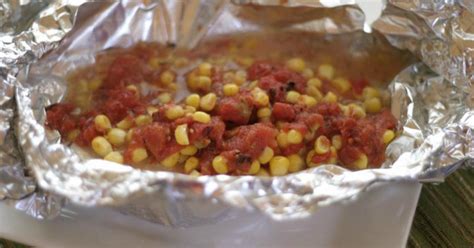 tilapia-with-garlic-roasted-tomatoes-and-corn-once image