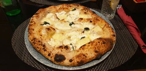 pizza-quattro-formaggi-authentic-recipe-tasteatlas image