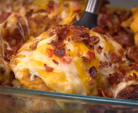 four-cheese-bacon-stuffed-smothered-chicken-casserole image
