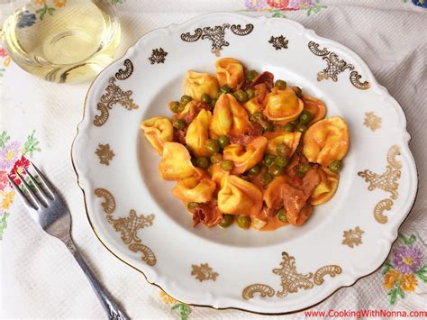 tortellini-with-peas-and-prosciutto-in-pink-sauce image