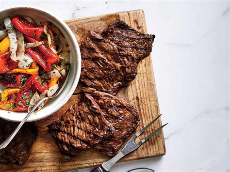 balsamic-and-soy-marinated-skirt-steaks-with-charred-peppers image