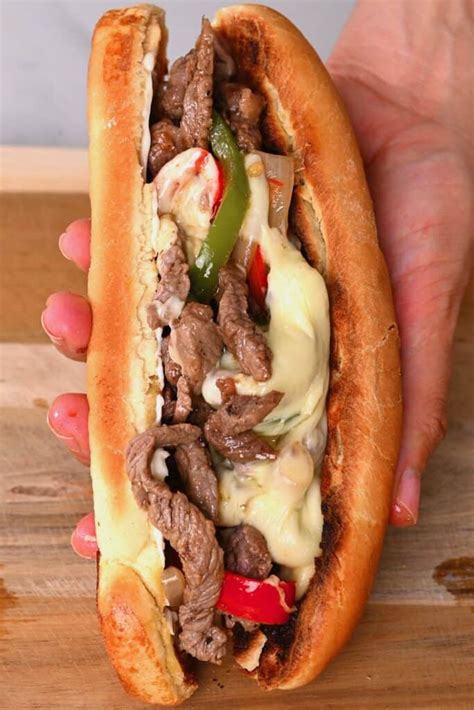 authentic-philly-cheesesteak-sandwich-alphafoodie image