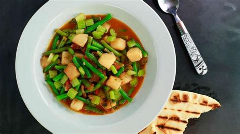 zesty-green-bean-stew-recipe-rachael-ray-show image