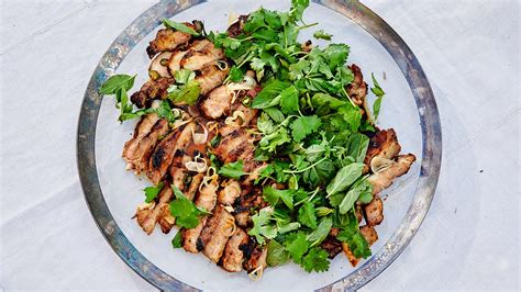 grilled-pork-shoulder-steaks-with-herb-salad image