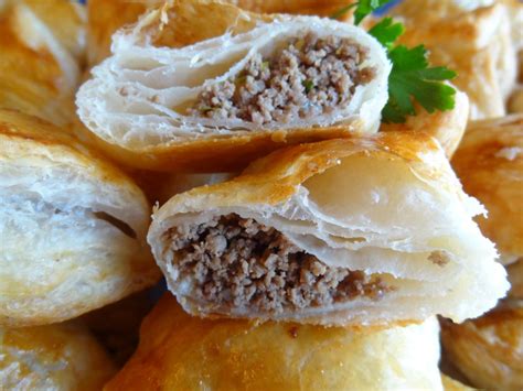 pasteis-de-carne-savory-beef-puff-pastry-pockets image