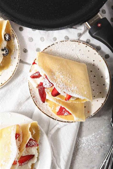 sweet-breakfast-crepes-with-lemon-whipped-cream image