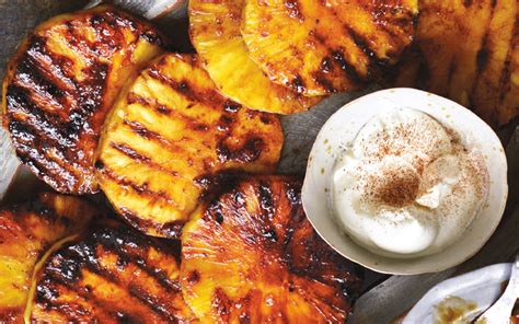 spice-grilled-pineapple-with-smoky-whipped-cream image
