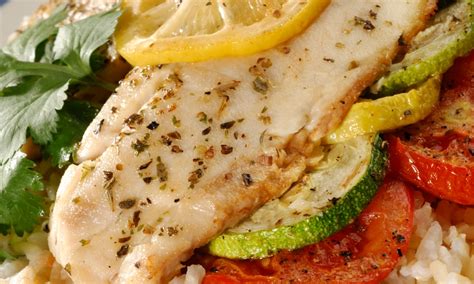oven-roasted-tilapia-and-vegetables-with-lemon-herb image