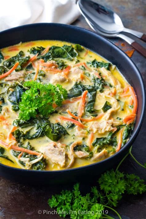 coconut-curry-soup-with-chicken-carrots-and-kale image