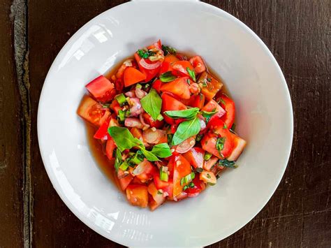 thai-style-tomato-salad-with-lemon-basil-messy-vegan image