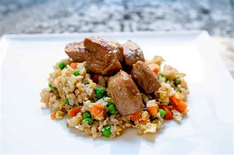 teriyaki-pork-tenderloin-and-fried-brown-rice-mercy image
