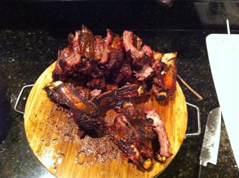 how-to-barbecue-beef-ribs-on-the-grill-delishably image