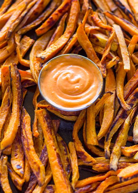 baked-sweet-potato-fries-with-sriracha-dipping-sauce image