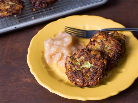 zucchini-latkes-with-parmesan-pine-nuts-and-basil image