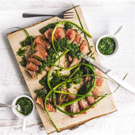 grilled-steak-with-salsa-verde-italian-herb-sauce-bacon image