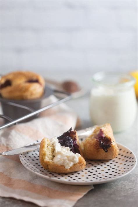lemon-berry-popovers-with-honeyed-goat-cheese image