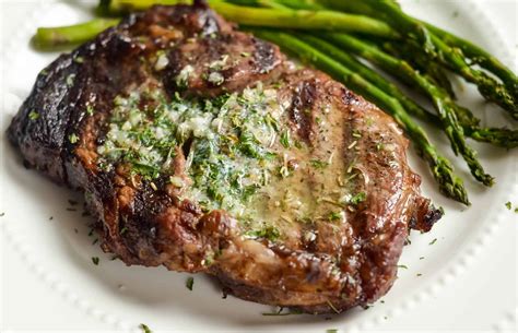 how-to-make-garlic-butter-ribeyes-on-the-grill image
