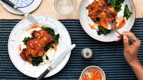 fried-chicken-thighs-with-cheesy-grits-recipe-bon-apptit image