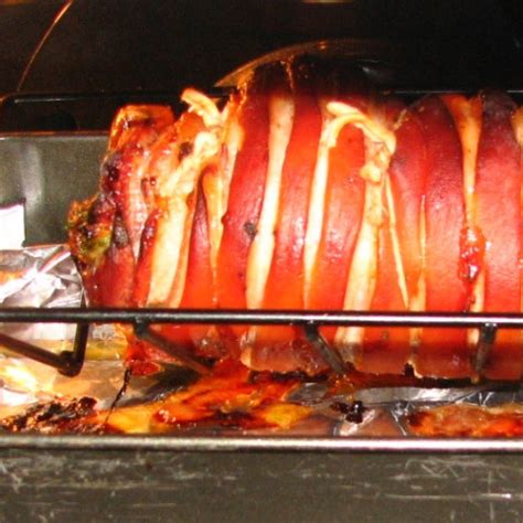 rolled-pork-belly-with-apricot-honey-stuffing image