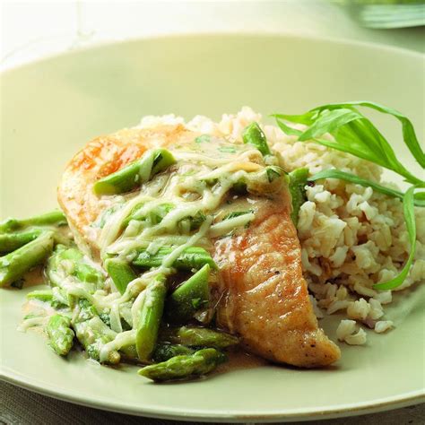 chicken-asparagus-with-melted-gruyere-eatingwell image