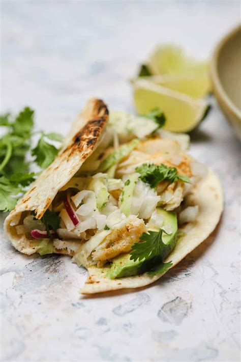baja-style-grilled-fish-tacos-recipe-well-seasoned-studio image