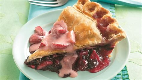 apple-blueberry-pie-with-strawberry-sauce image