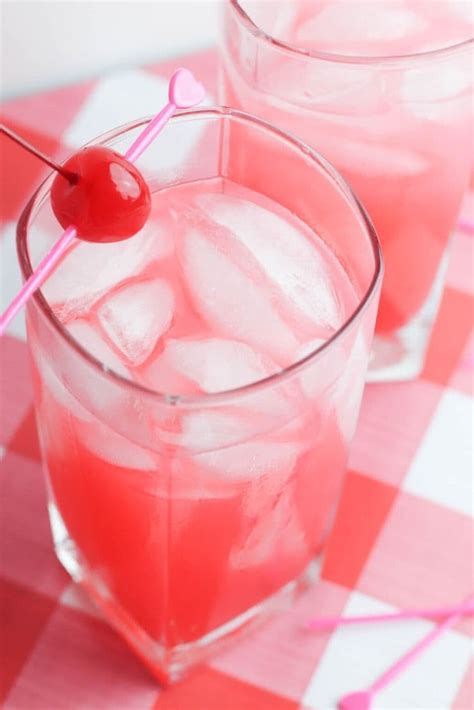 boozy-pink-lemonade-punch-champagne-and-coconuts image