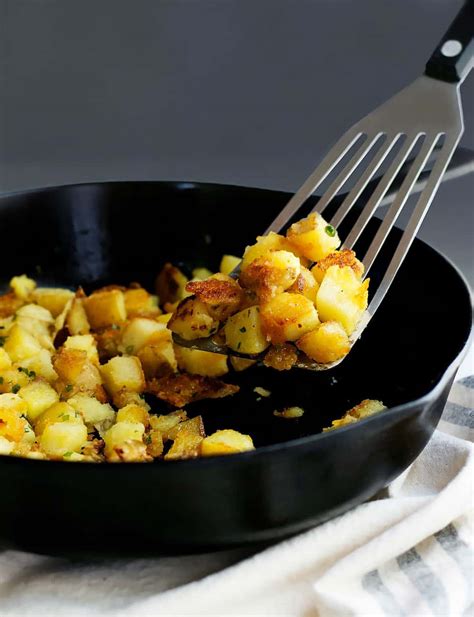 skillet-potatoes-crispy-outside-creamy-inside-pinch image
