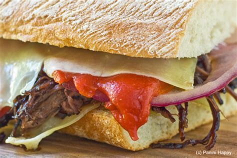 red-wine-braised-flank-steak-with-roasted-peppers-panini image