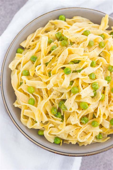 buttered-egg-noodle-side-dish-with-peas-pumpkin image