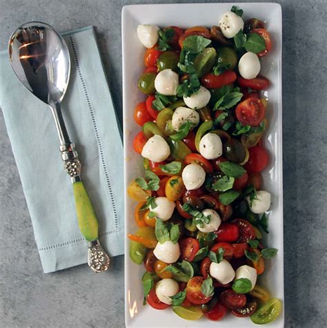 cherry-tomato-salad-with-fresh-mozzarella-and-basil image